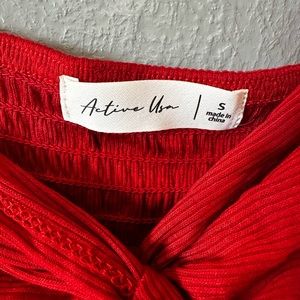 Small active USA cropped red shirt. Never worn because it’s too short for me.